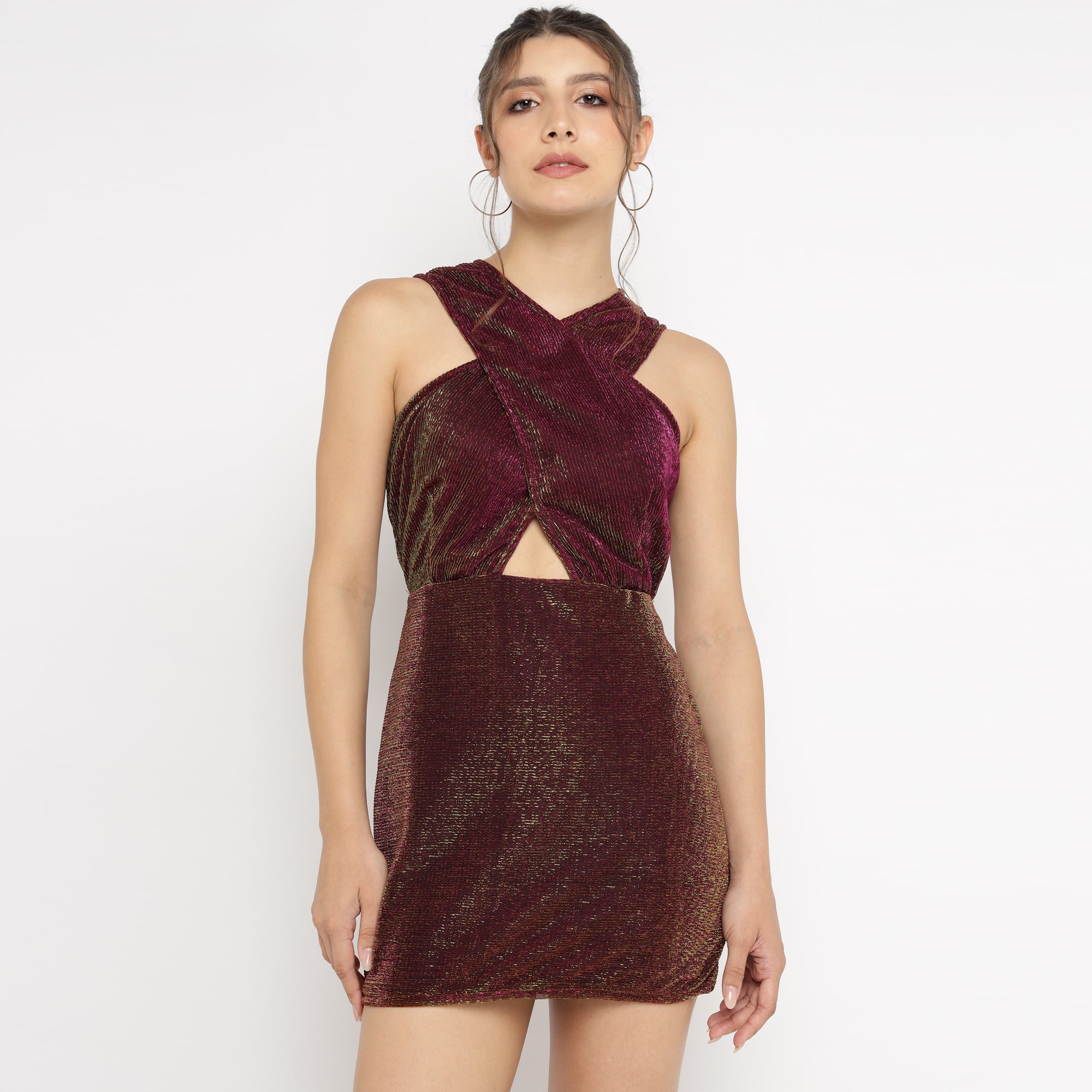 Model wearing burgundy-gold metallic bodycon mini dress with halter neck and front cut-out – The Ulluu