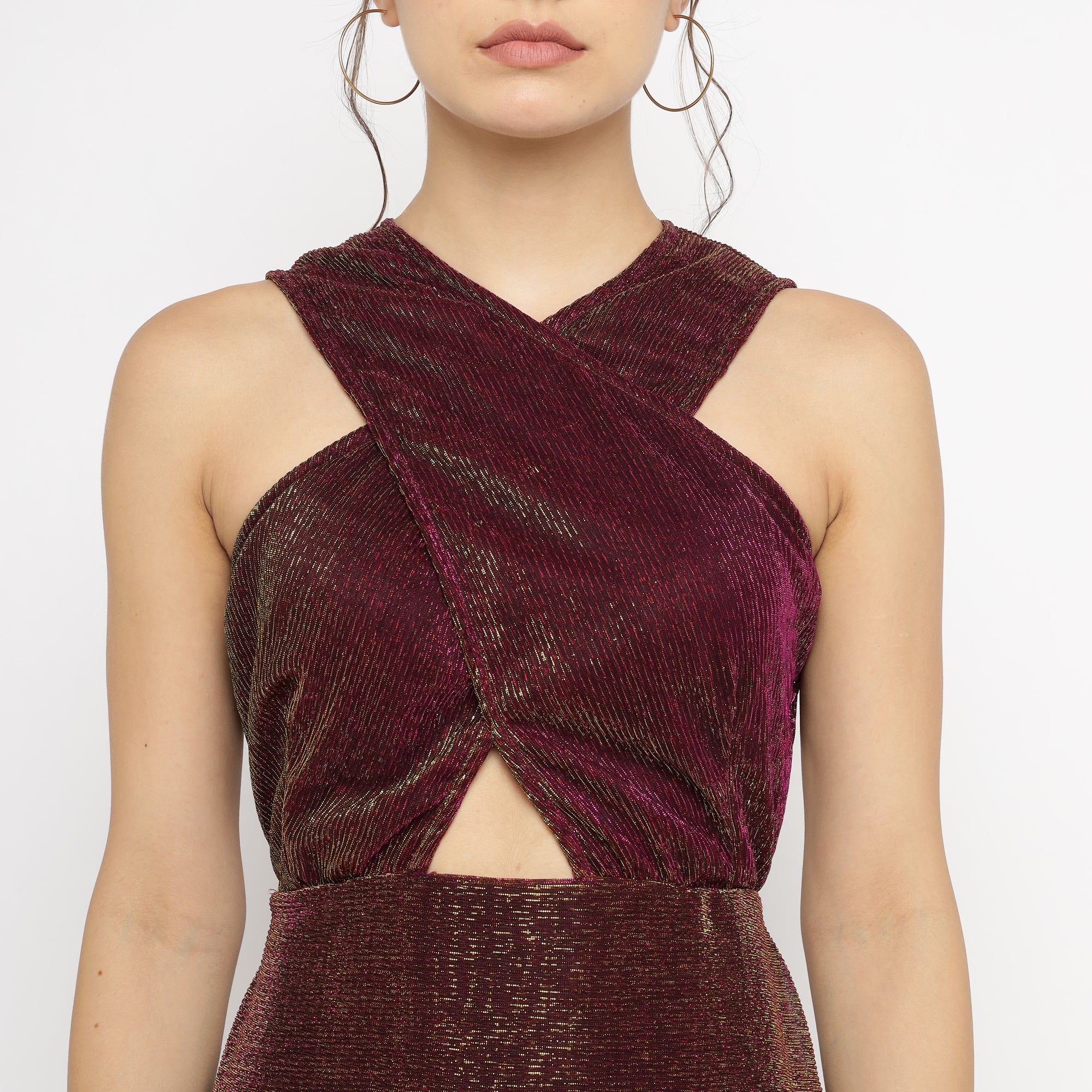 Front view of burgundy-gold metallic bodycon mini dress with cross-front halter neckline and midriff cutout – The Ulluu